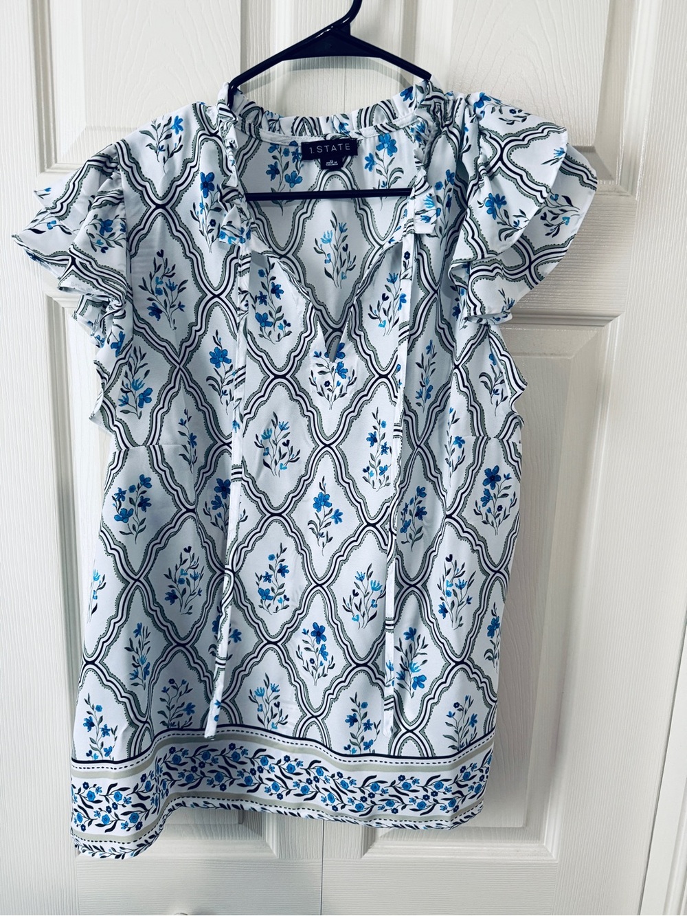 2 sets of woman’s dress tops size L
